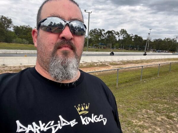 Male wearing a DSK T-shirt at the drag strip