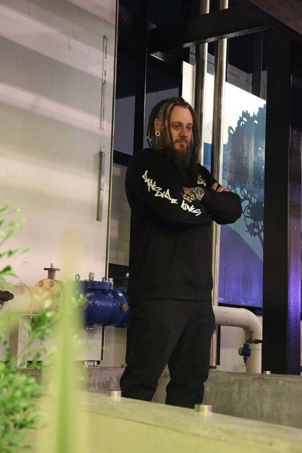 Male wearing a DSK Hoodie