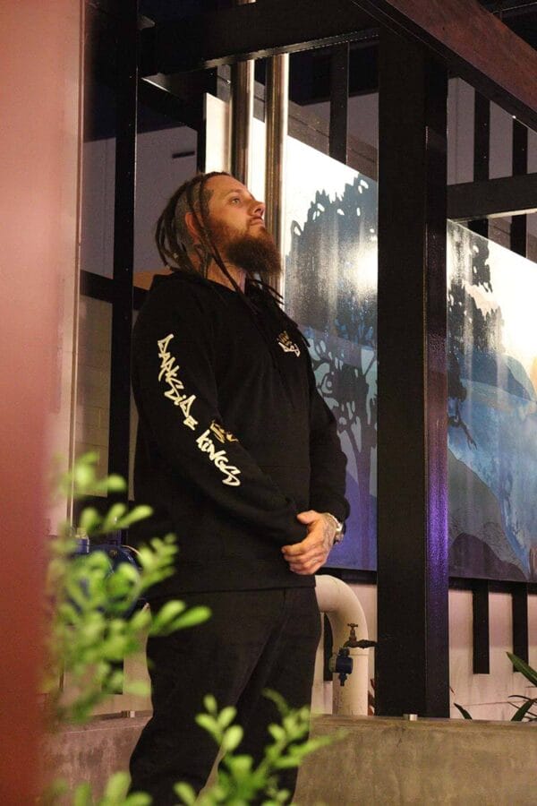 Male wearing a DSK Hoodie