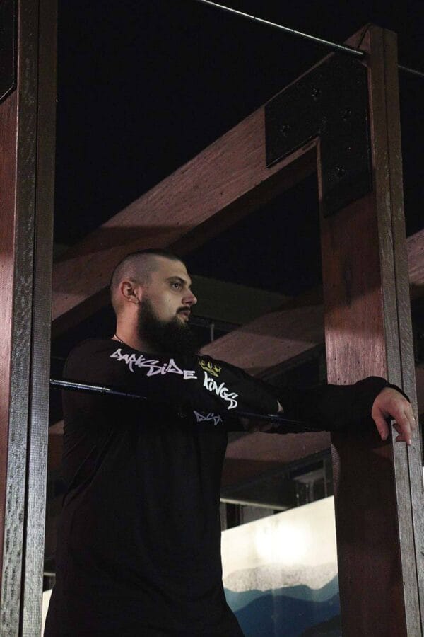 Male wearing a long sleeve DSK shirt