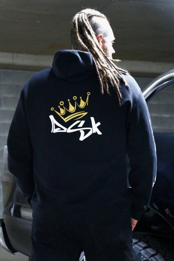 Back view of a male wearing a DSK Hoodie