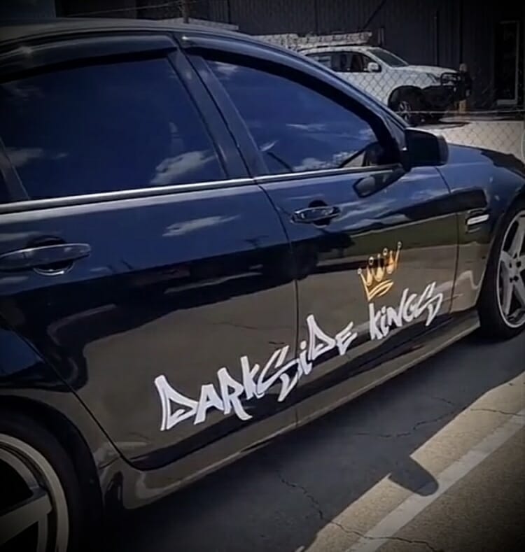 Darkside Kings Sticker on the side doors of a customers vehicle